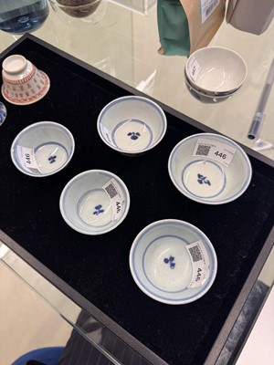 Lot 446 - A group of five Chinese blue and white cups, Qing dynasty, 18th/19th century