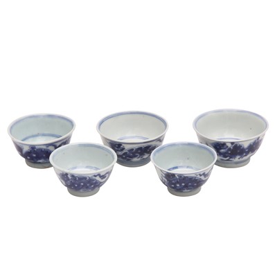 Lot 446 - A group of five Chinese blue and white cups, Qing dynasty, 18th/19th century