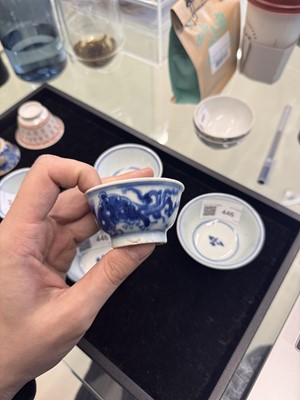 Lot 446 - A group of five Chinese blue and white cups, Qing dynasty, 18th/19th century