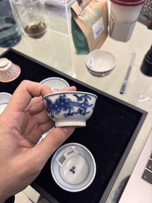 Lot 446 - A group of five Chinese blue and white cups, Qing dynasty, 18th/19th century