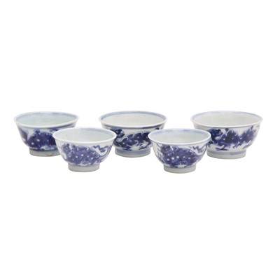 Lot 446 - A group of five Chinese blue and white cups, Qing dynasty, 18th/19th century