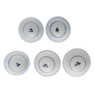 Lot 446 - A group of five Chinese blue and white cups, Qing dynasty, 18th/19th century
