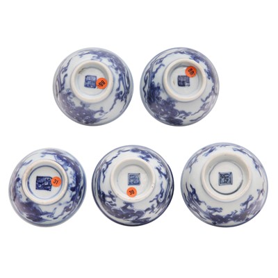 Lot 446 - A group of five Chinese blue and white cups, Qing dynasty, 18th/19th century