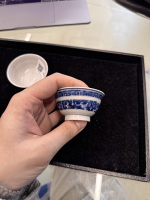 Lot 444 - Two Chinese blue and white cups, Qing dynasty, 18th/19th century