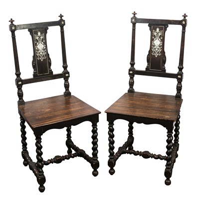 Lot 354 - A pair of Italian Renaissance Revival ivory inlaid ebonised hall chairs