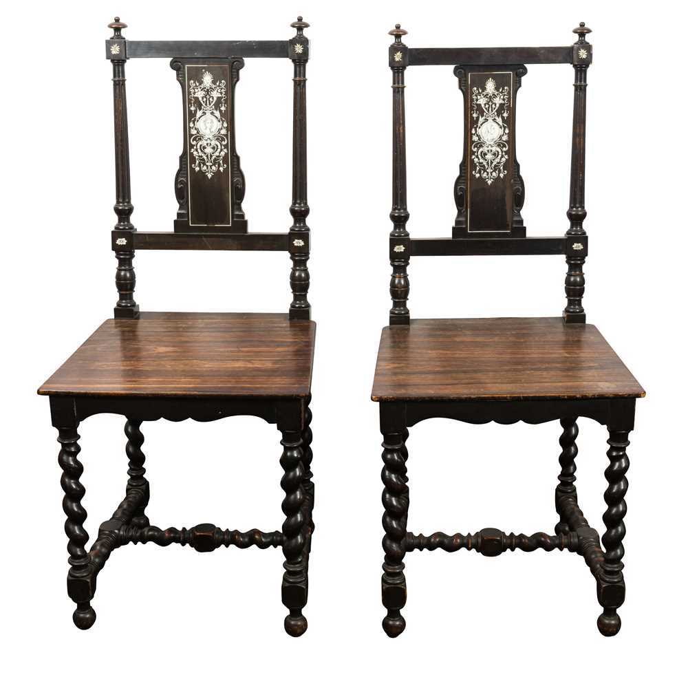 Lot 354 - A pair of Italian Renaissance Revival ivory inlaid ebonised hall chairs