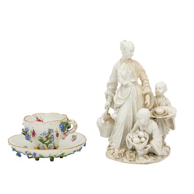 Lot 1 - A 19th Century Meissen porcelain miniature cup and saucer
