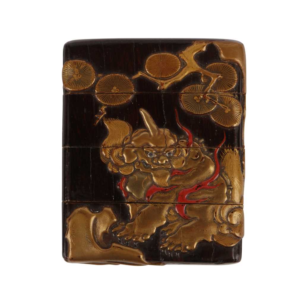 Lot 48 - A Japanese three-case lacquer inro with shishi, Kajikawa family, Edo period, 19th century