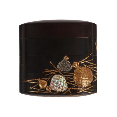 Lot 46 - A fine Japanese three-case roiro lacquer inro with pine cones, Edo period, 18th century