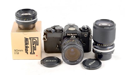 Lot 263 - Black Nikon FE Wide & Tele Lens Outfit.