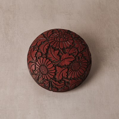 Lot 71 - A rare Chinese cinnabar lacquer 'chrysanthemum' box and cover, Ming dynasty
