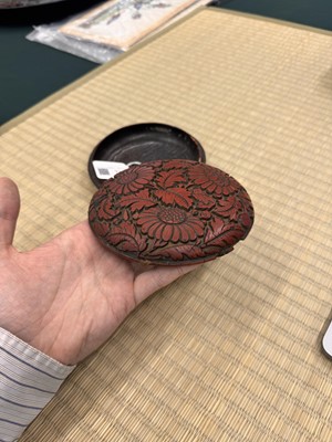 Lot 71 - A rare Chinese cinnabar lacquer 'chrysanthemum' box and cover, Ming dynasty