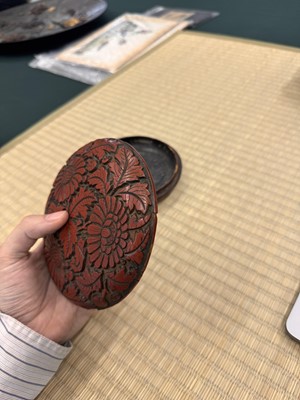Lot 71 - A rare Chinese cinnabar lacquer 'chrysanthemum' box and cover, Ming dynasty