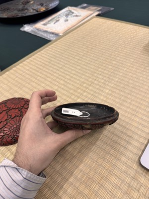 Lot 71 - A rare Chinese cinnabar lacquer 'chrysanthemum' box and cover, Ming dynasty