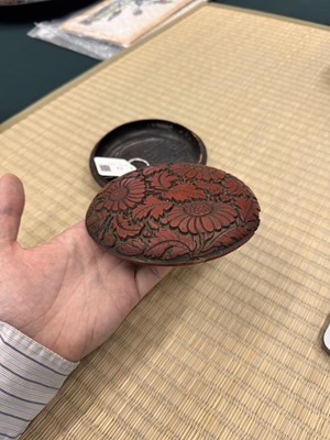 Lot 71 - A rare Chinese cinnabar lacquer 'chrysanthemum' box and cover, Ming dynasty