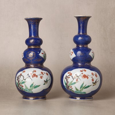 Lot 195 - A pair of Chinese powder-blue ground famille-verte triple gourd vases, Qing dynasty, Kangxi period