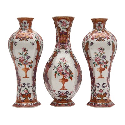 Lot 210 - A Chinese export famille-rose three piece vase garniture, Qing dynasty, late 18th century