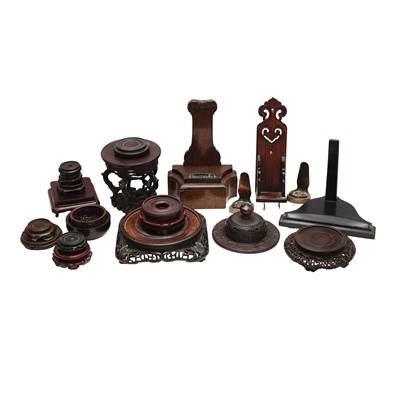 Lot 575 - A large group of Chinese wood stands and covers, 19th/20th century