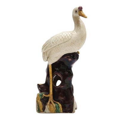 Lot 209 - A Chinese famille-verte biscuit 'crane' figure, 19th century