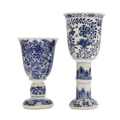 Lot 186 - Two Chinese blue and white 'floral' goblets, Qing dynasty, Kangxi period