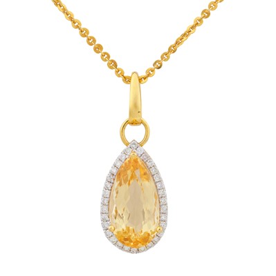 Lot 199 - A topaz and diamond pendant necklace
