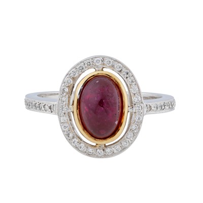 Lot 155 - A ruby and diamond cluster ring