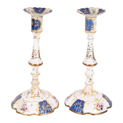 Lot 153 - A pair of Staffordshire enamel candlesticks