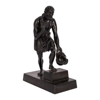 Lot 49 - A Grand Tour bronze figure of a beggar
