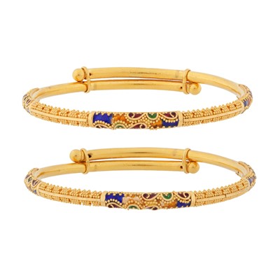 Lot 104 - A pair of enamel child bangles