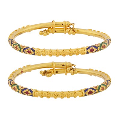 Lot 348 - A pair of enamel bangles