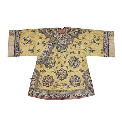 Lot 395 - A fine Chinese yellow-ground embroidered silk robe, Qing dynasty, 19th Century