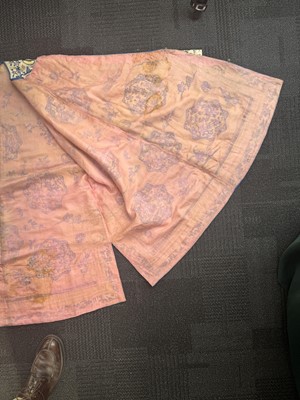 Lot 395 - A fine Chinese yellow-ground embroidered silk robe, Qing dynasty, 19th Century