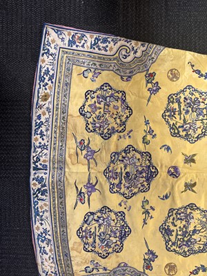 Lot 395 - A fine Chinese yellow-ground embroidered silk robe, Qing dynasty, 19th Century
