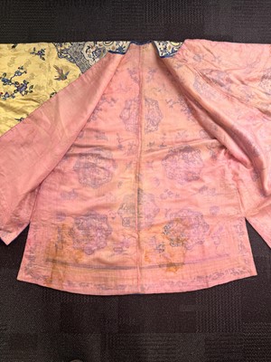 Lot 395 - A fine Chinese yellow-ground embroidered silk robe, Qing dynasty, 19th Century