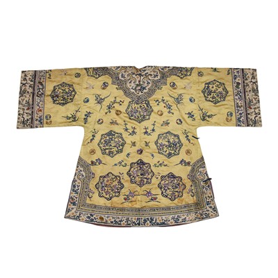 Lot 395 - A fine Chinese yellow-ground embroidered silk robe, Qing dynasty, 19th Century