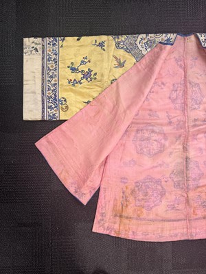 Lot 395 - A fine Chinese yellow-ground embroidered silk robe, Qing dynasty, 19th Century