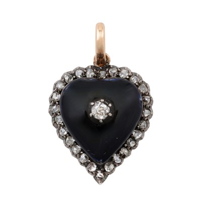 Lot 135 - An onyx and diamond memorial pendant