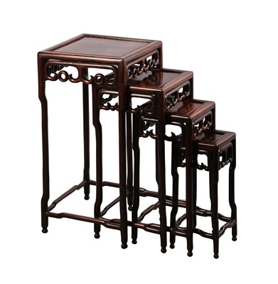 Lot 560 - A nest of four Chinese wood side tables, late Qing dynasty