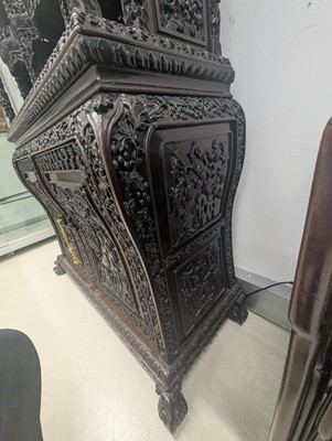 Lot 130 - A fine Chinese export carved and pierced hardwood (hongmu) display cabinet, late 19th century