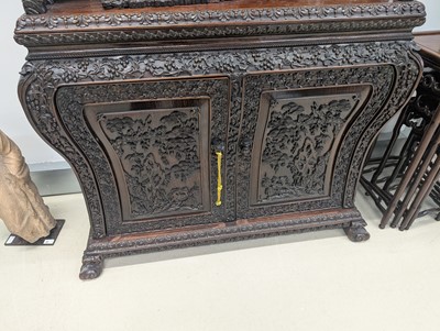 Lot 130 - A fine Chinese export carved and pierced hardwood (hongmu) display cabinet, late 19th century