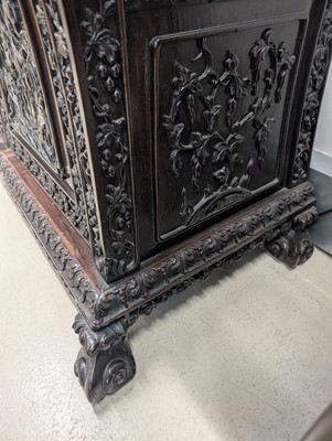 Lot 130 - A fine Chinese export carved and pierced hardwood (hongmu) display cabinet, late 19th century