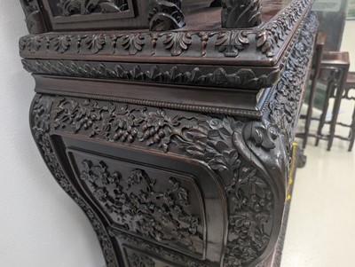Lot 130 - A fine Chinese export carved and pierced hardwood (hongmu) display cabinet, late 19th century