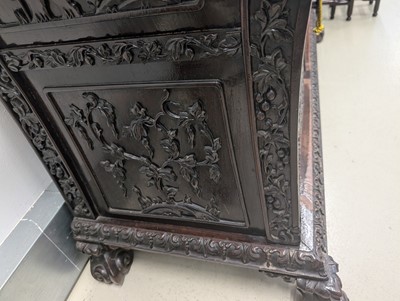Lot 130 - A fine Chinese export carved and pierced hardwood (hongmu) display cabinet, late 19th century