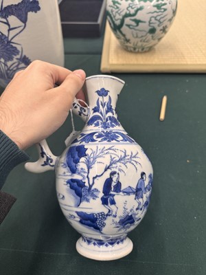 Lot 3 - A Chinese blue and white 'figural' jug, Transitional period, Chongzhen period