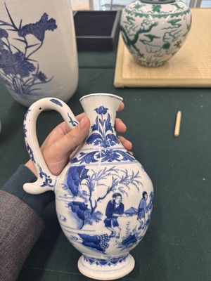 Lot 3 - A Chinese blue and white 'figural' jug, Transitional period, Chongzhen period