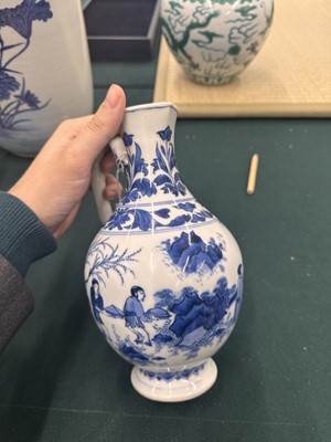 Lot 3 - A Chinese blue and white 'figural' jug, Transitional period, Chongzhen period