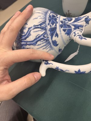 Lot 3 - A Chinese blue and white 'figural' jug, Transitional period, Chongzhen period