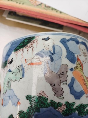 Lot 505 - A Chinese wucai 'Luohan' brush pot, 19th - 20th century