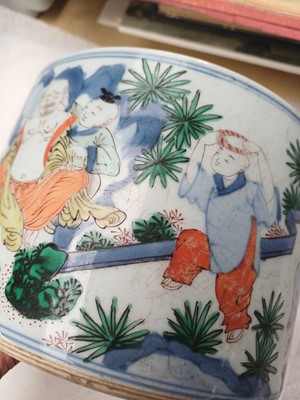 Lot 505 - A Chinese wucai 'Luohan' brush pot, 19th - 20th century