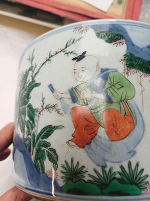 Lot 505 - A Chinese wucai 'Luohan' brush pot, 19th - 20th century